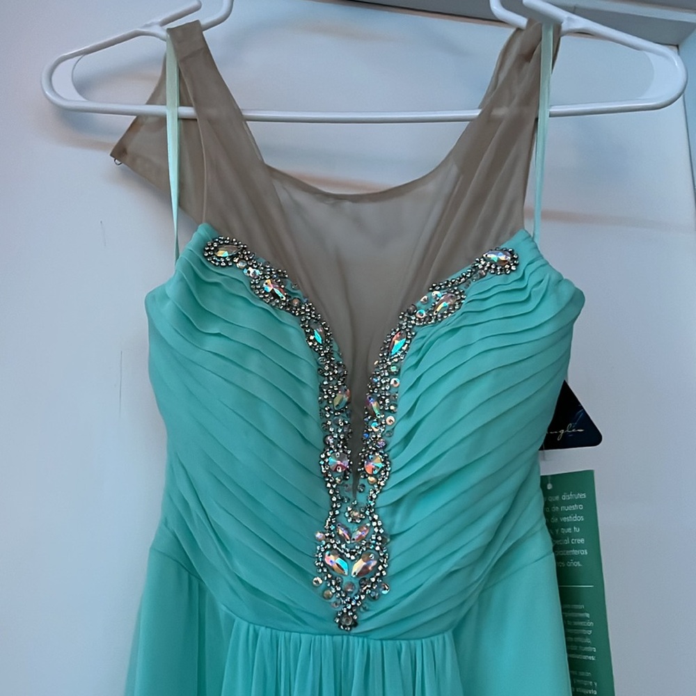 Baby blue, bejeweled prom dress. Never worn, mesh sleeves, new with tags
